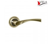 Дверная ручка Прима (Vela) бронза